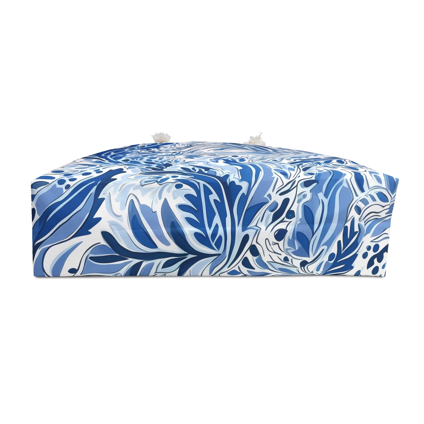 Bottom view of the Nags Head Weekender tote bag with a blue and white patterned tropical design.