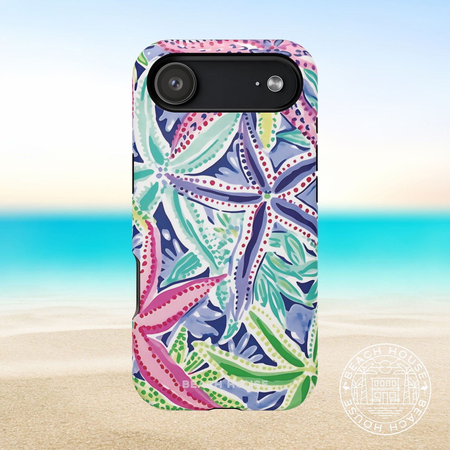 Siesta Key MagSafe Tough Case for iPhone 17 Air with colorful starfish pattern on a beach background