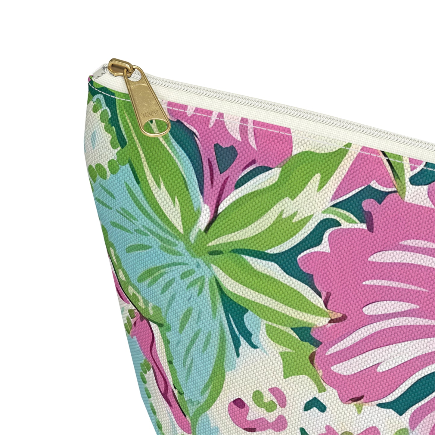 Close up view of Seaside Accessory Pouch with a gold zipper on a white background
