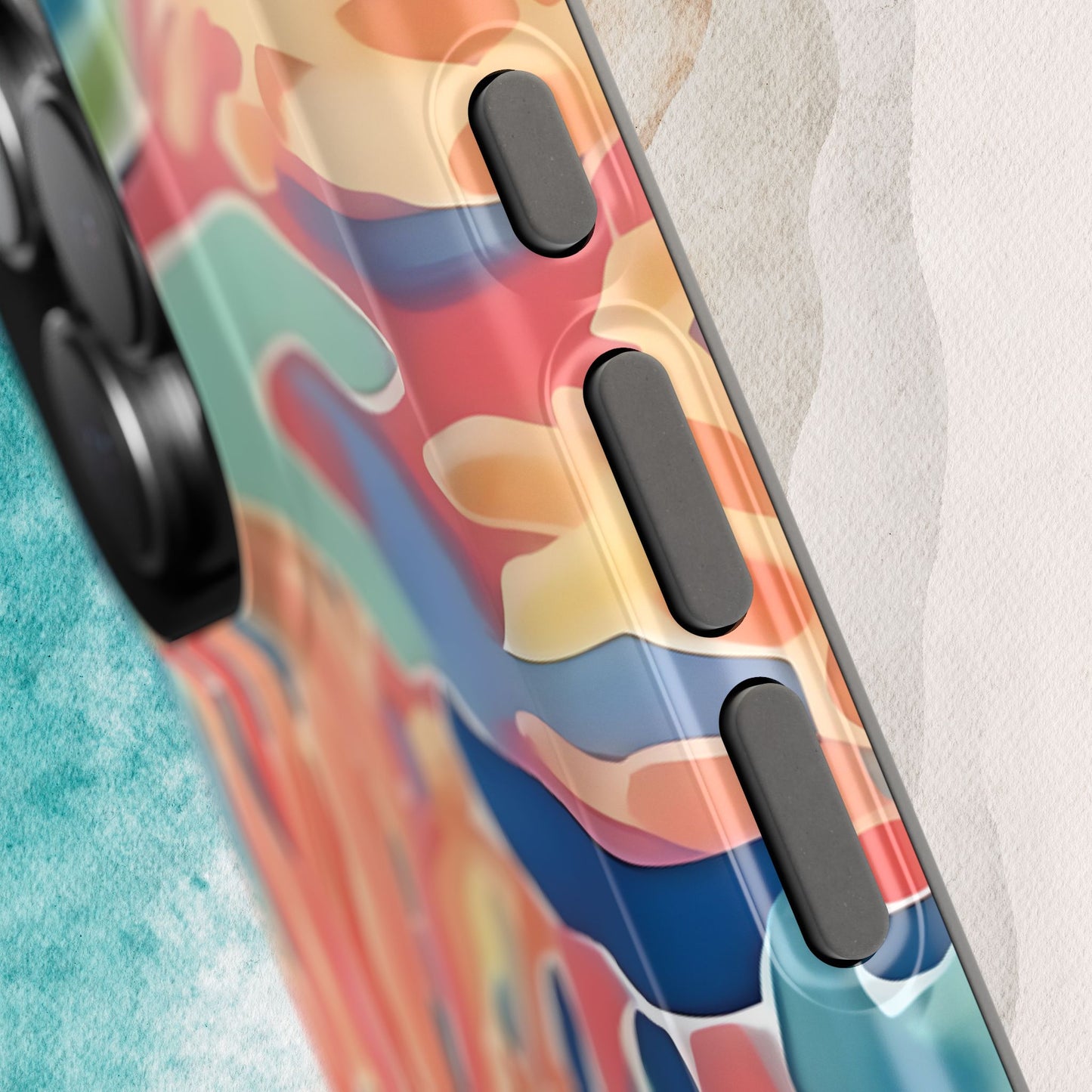 Close up view of Key Biscayne MagSafe Tough Phone case with colorful abstract design on a textured surface