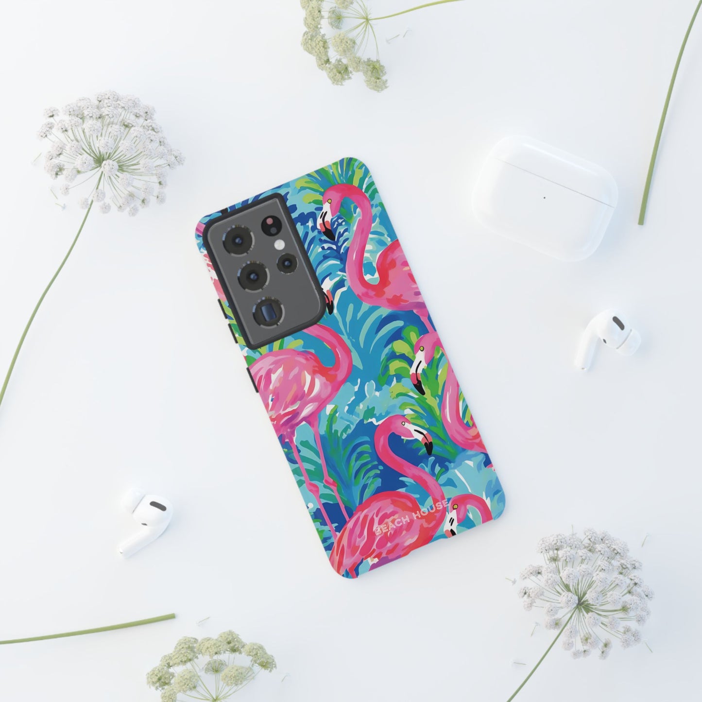 Key Largo Tough Case for Galaxy with flamingo design on a white surface with flowers
