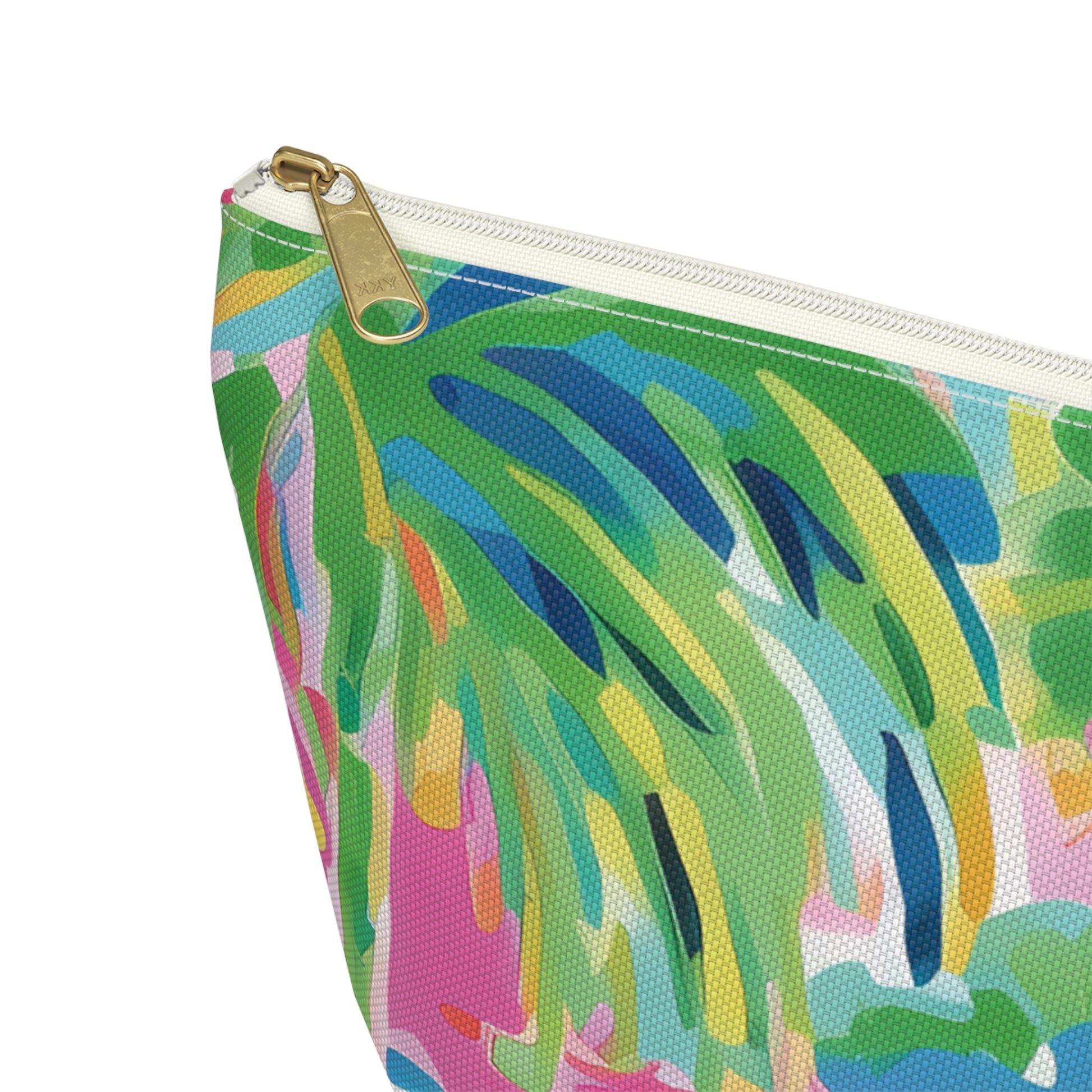 Close up view of Colorful pouch with a tropical leaf pattern on a white background