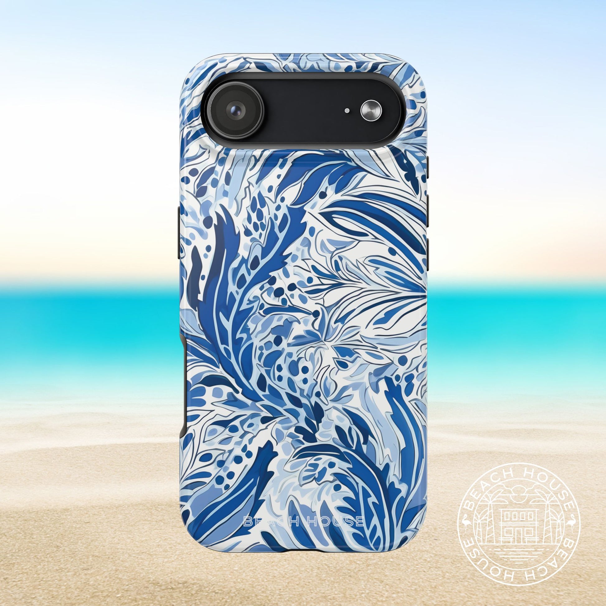 Nags Head case for iPhone 17 Air with blue floral pattern on a beach background