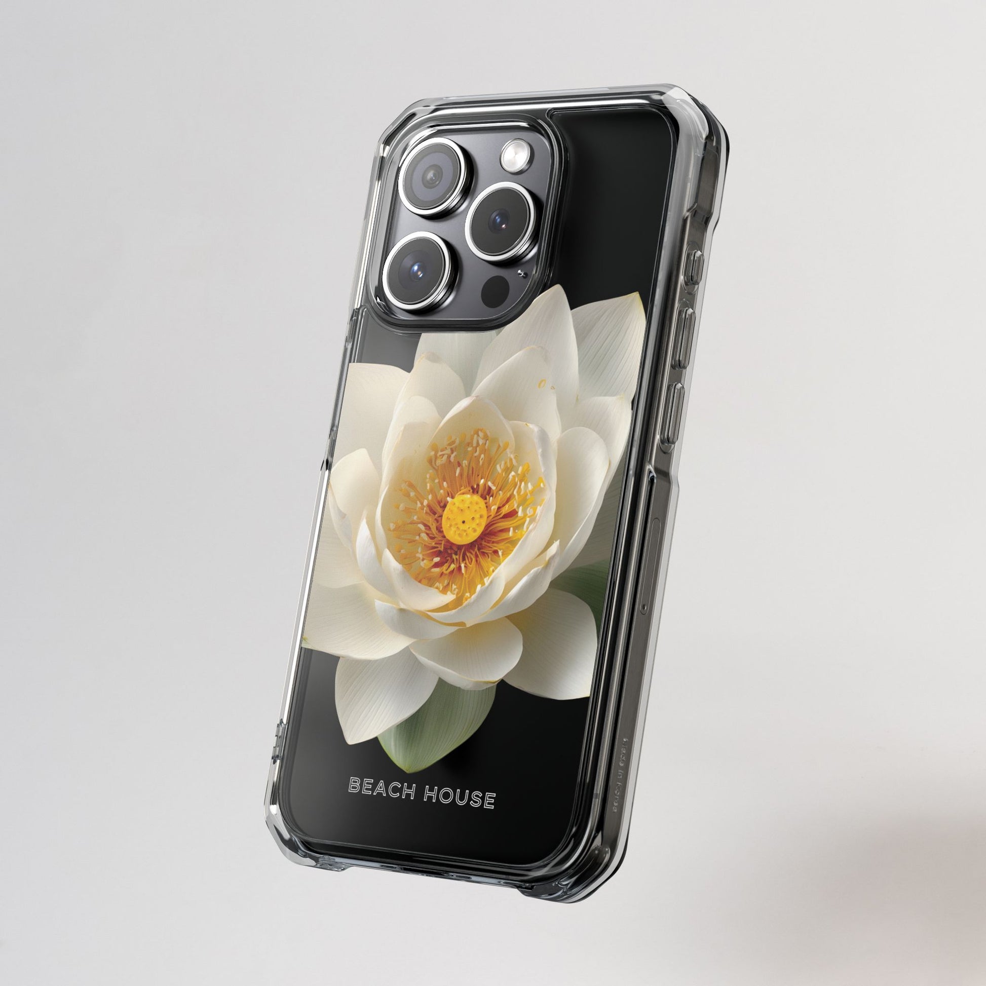 Phone case with a white flower design on a gray background