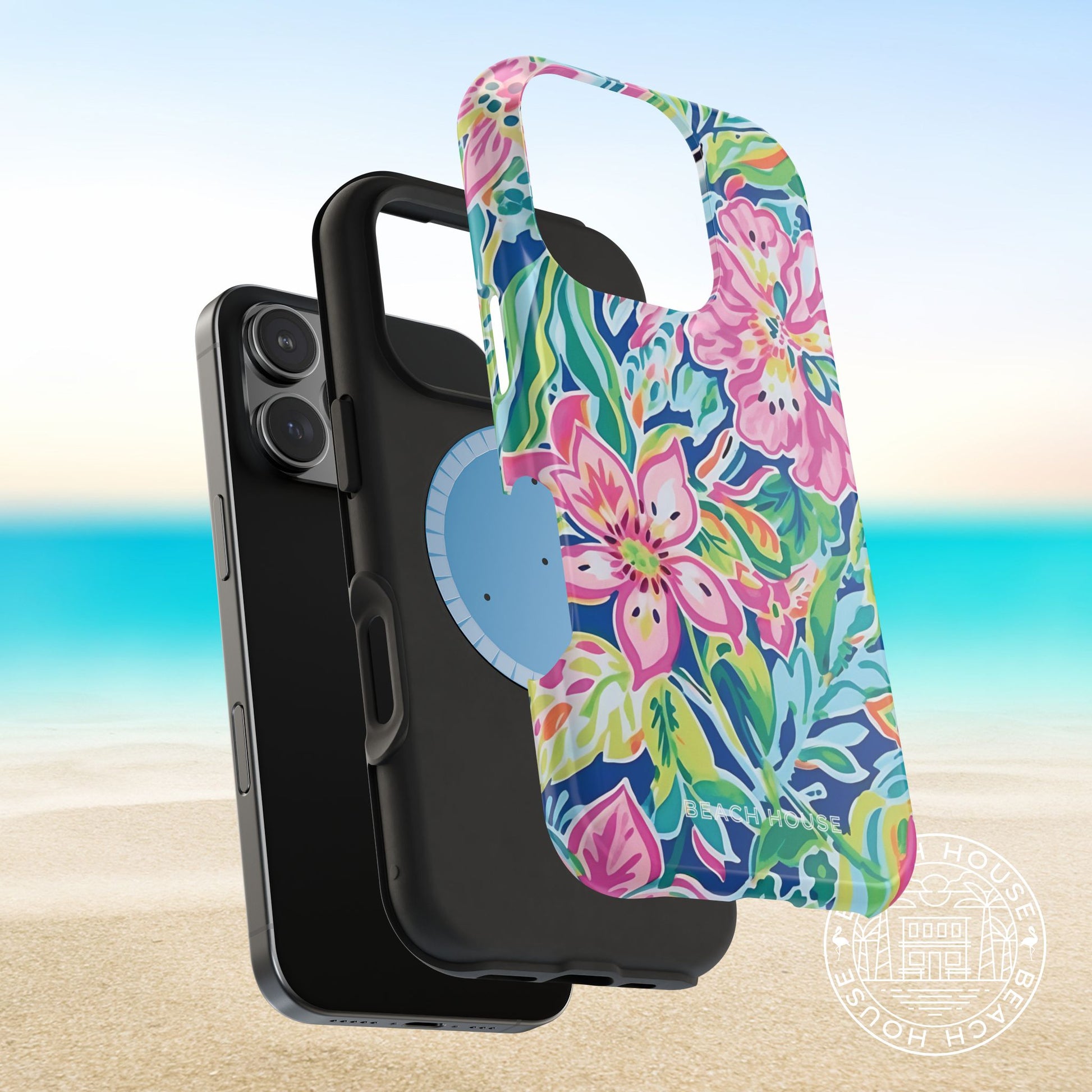 View of layers of the Fernandina MagSafe Tough Case for iPhone with a beach background