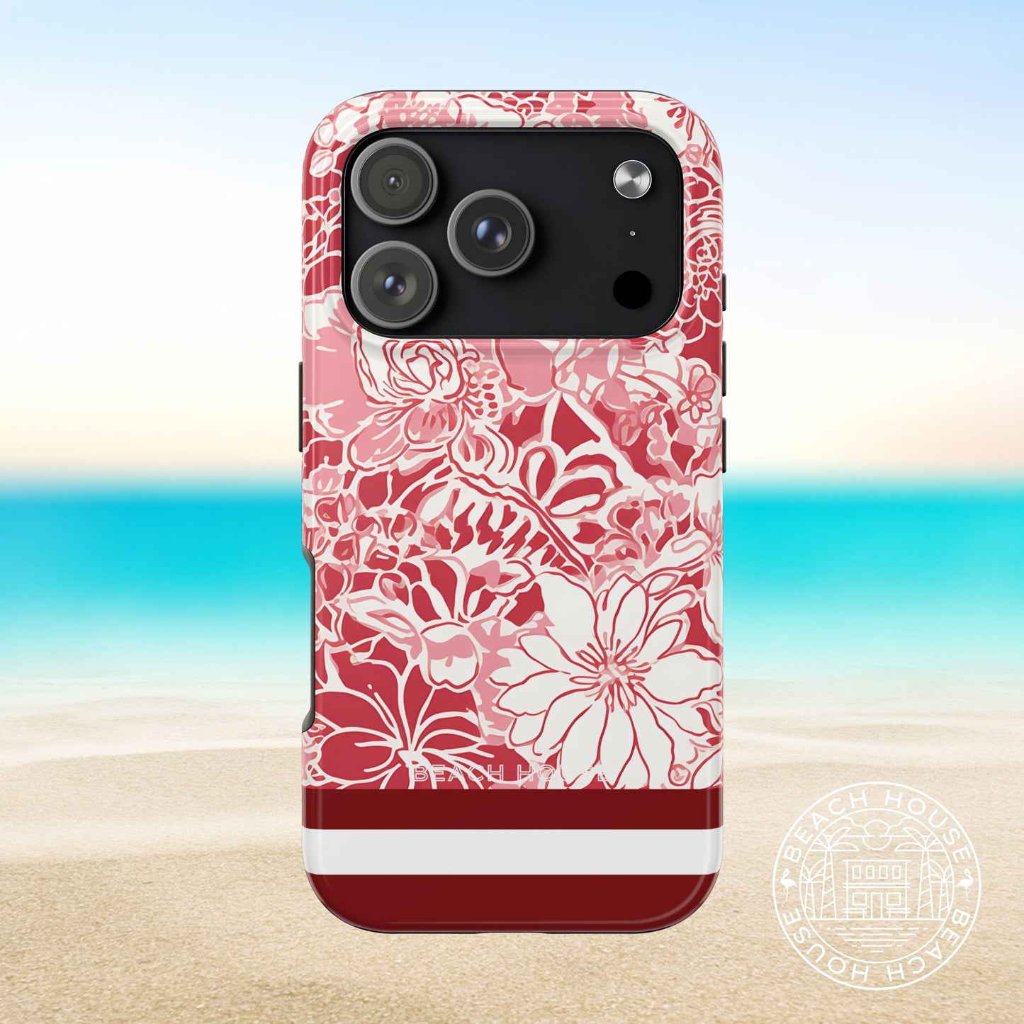 Norman Tough Case for iPhone 17 Pro with floral design on a beach background
