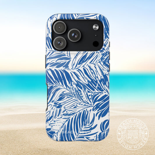 Hampton Tough Case for iPhone 17 Pro with blue and white palm leaf pattern on a beach background