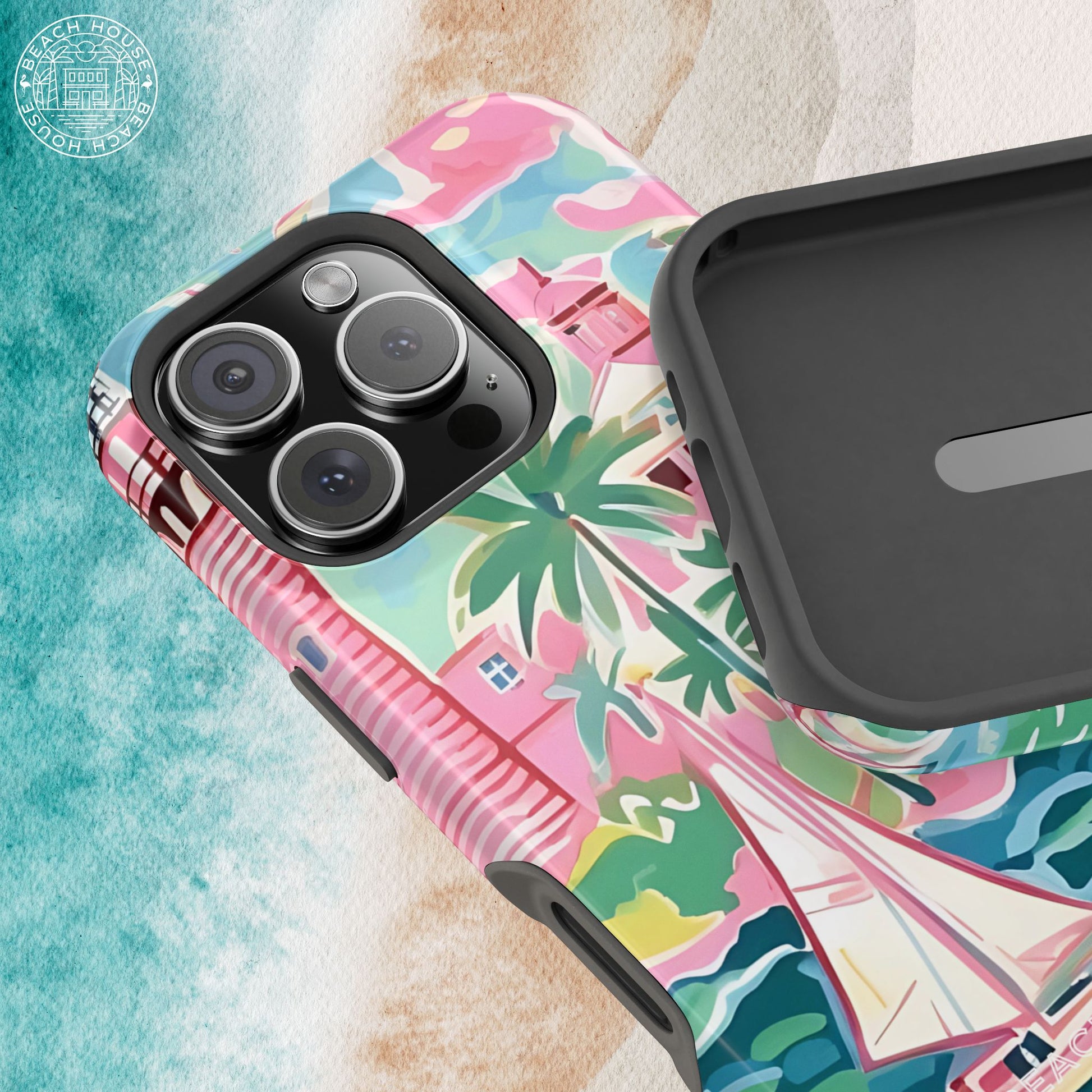 St. Simon MagSafe Tough Case for iPhone with colorful coastal design on a textured surface.