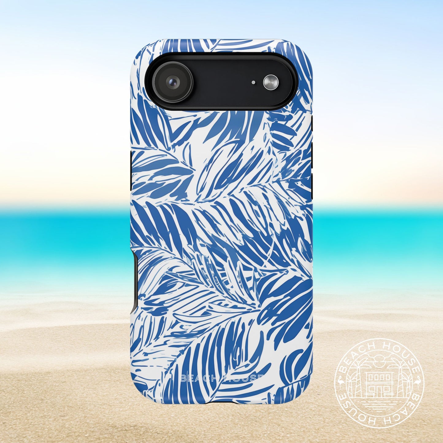 Hampton MagSafe Tough Case for iPhone 17 Air with blue leaf pattern on a beach background
