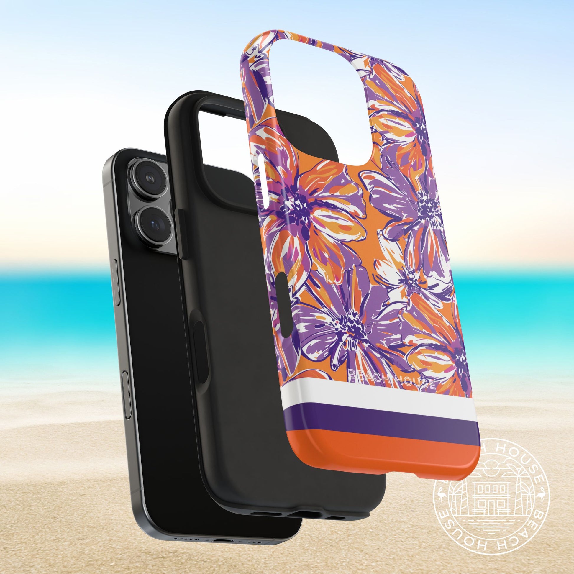 Protective layers of the Clemson Tough Case for iPhone with floral design on a beach background