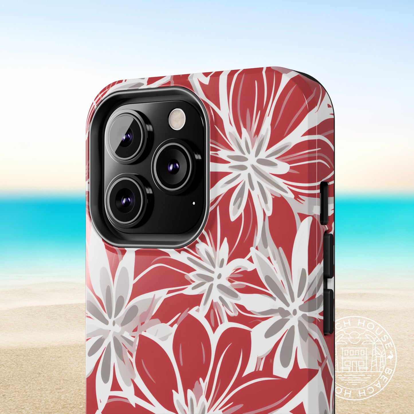 Columbus Tough case for iPhone  with red and white floral pattern on a beach background