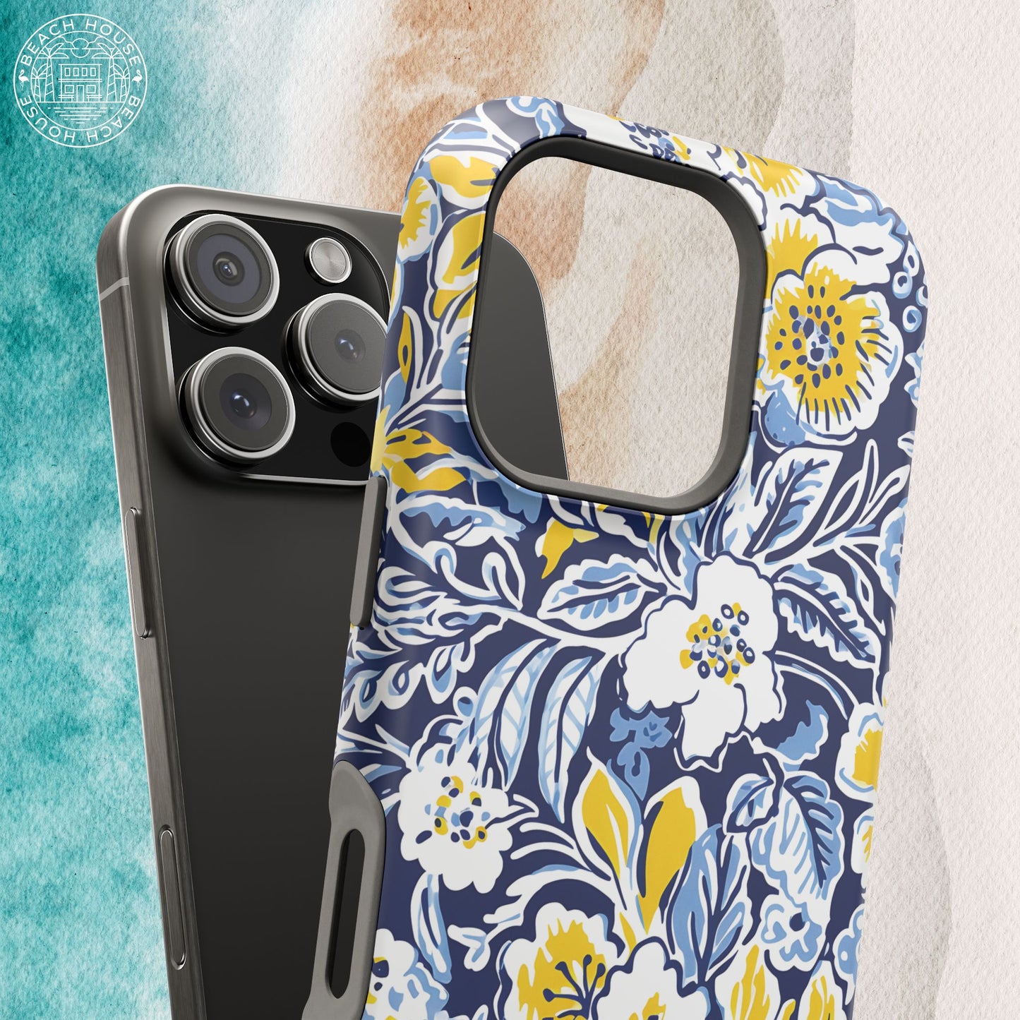 Ann Arbor MagSafe Tough Case for iPhone with blue and yellow floral design on a marble background
