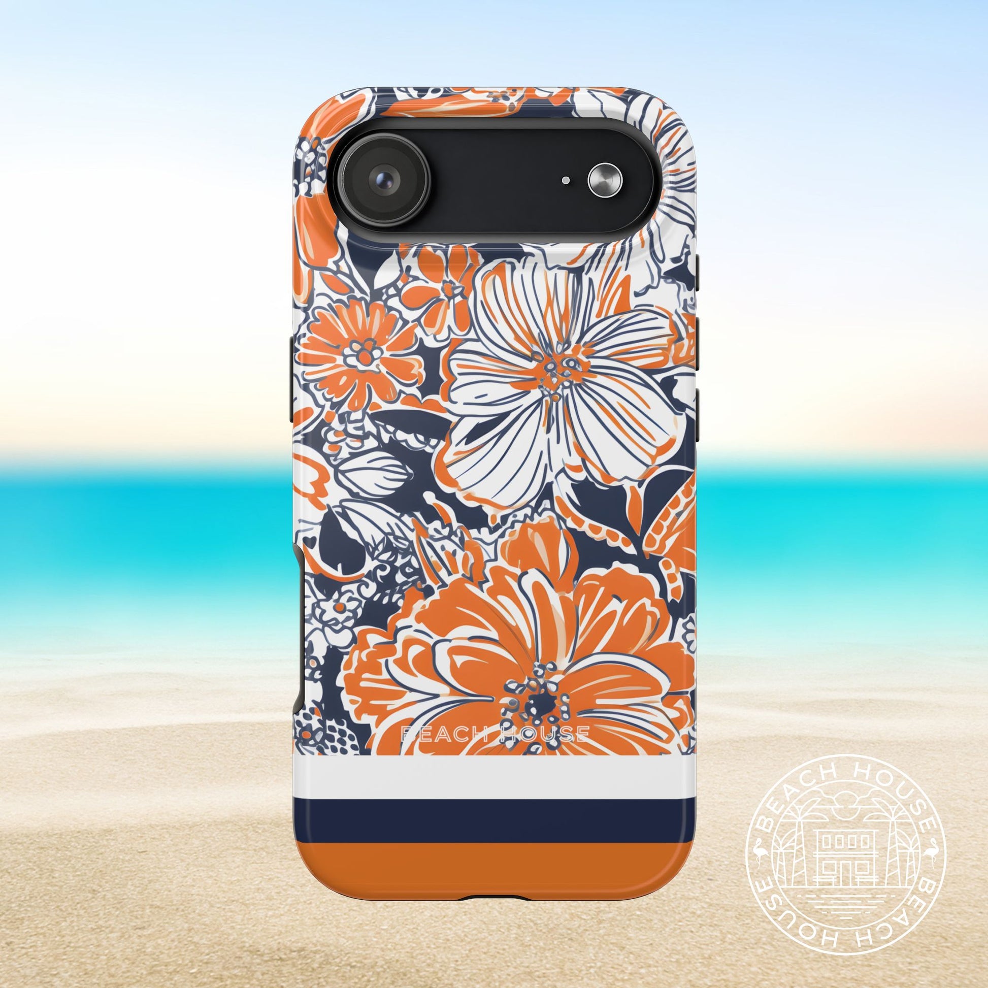 Charlottesville Tough Case for iPhone 17 Air with orange and navy floral pattern on a beach background