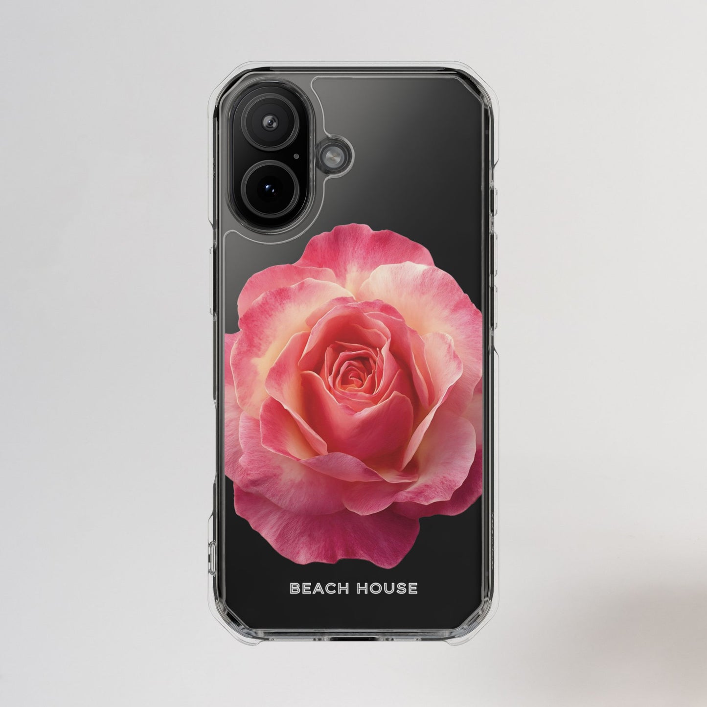 Phone case with a pink rose design on a light gray background