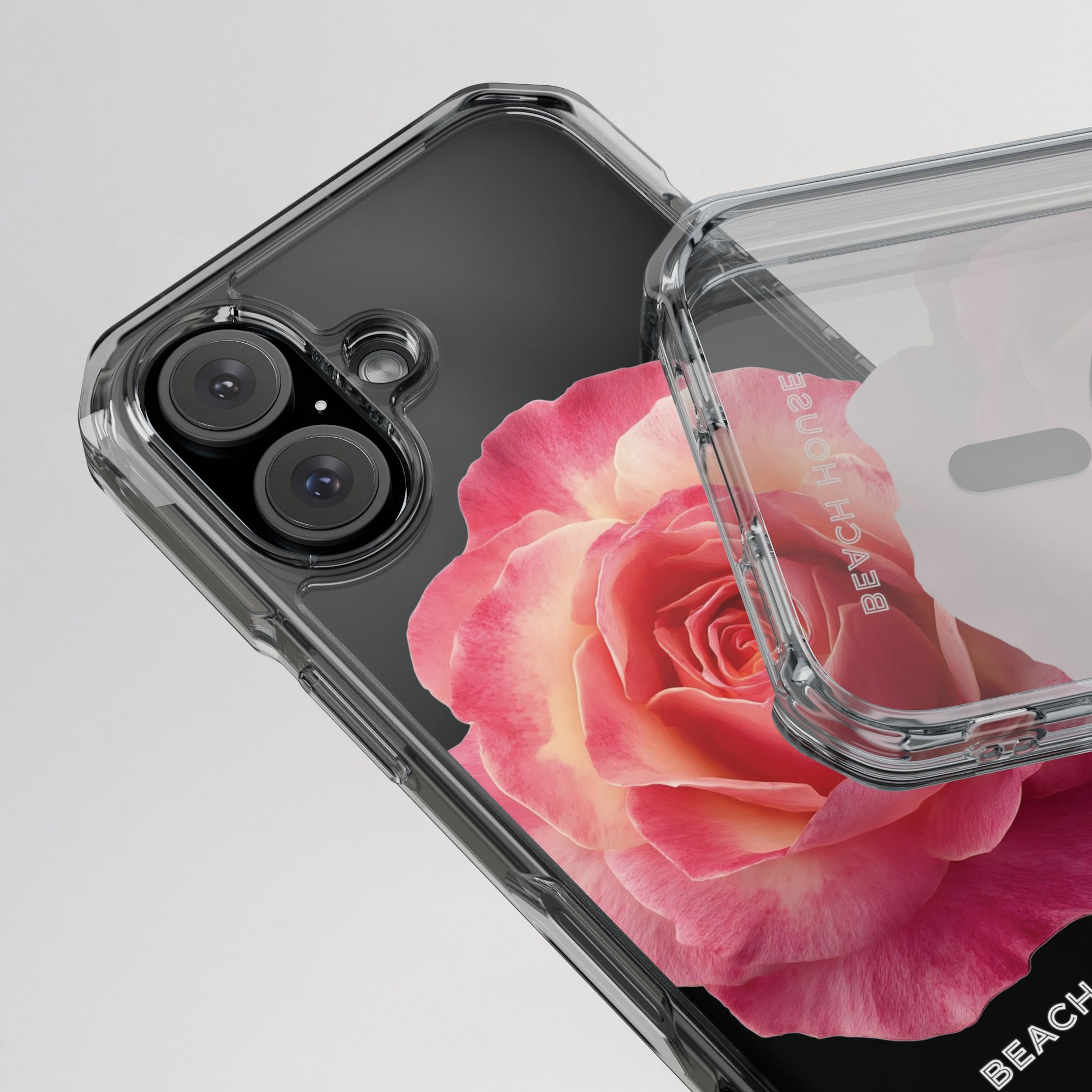 Phone case with a pink rose design on a white background