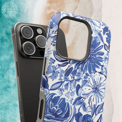 Blue floral Lexington MagSafe Tough Case for iPhone with a clear back on a marble background