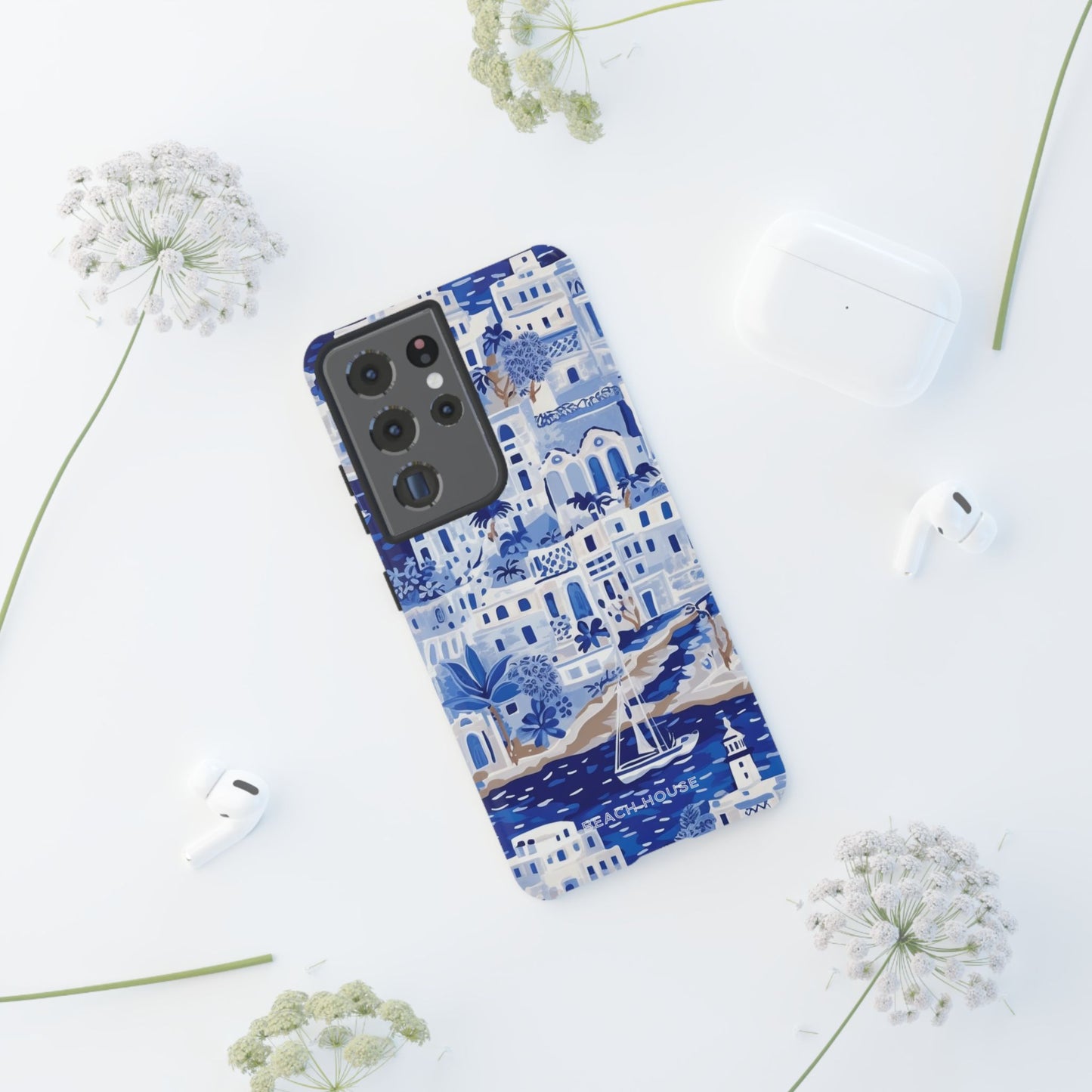 Santorini Tough Case for Galaxy with blue and white design on a white surface with flowers