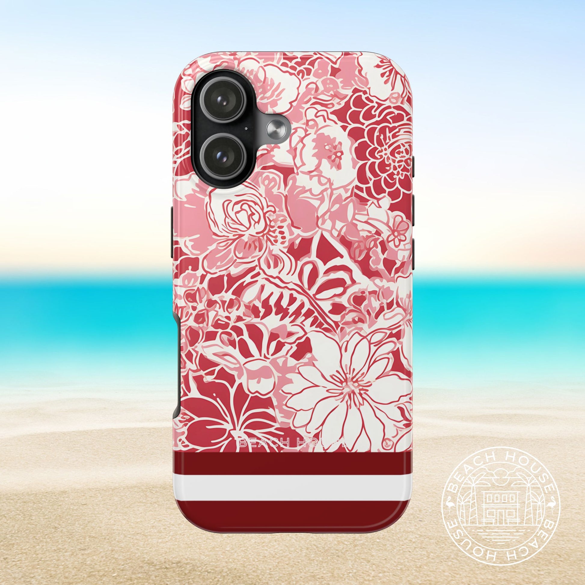 Norman Tough Case for iPhone 17 with floral pattern on a beach background