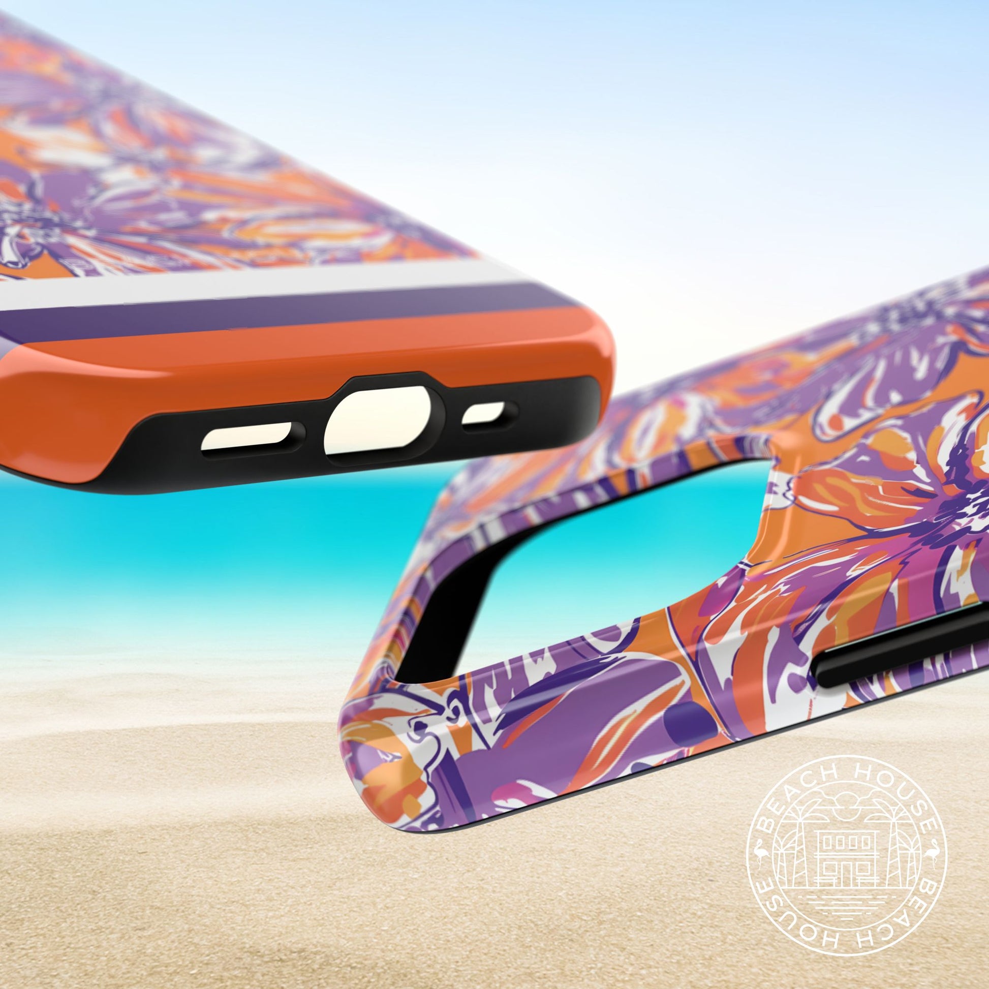 Top and bottom views of the Clemson Tough Case for iPhone with tropical design on a beach background