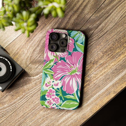 Tropical Seaside Slim Case for iPhone on a wooden surface with a camera and plant in the background