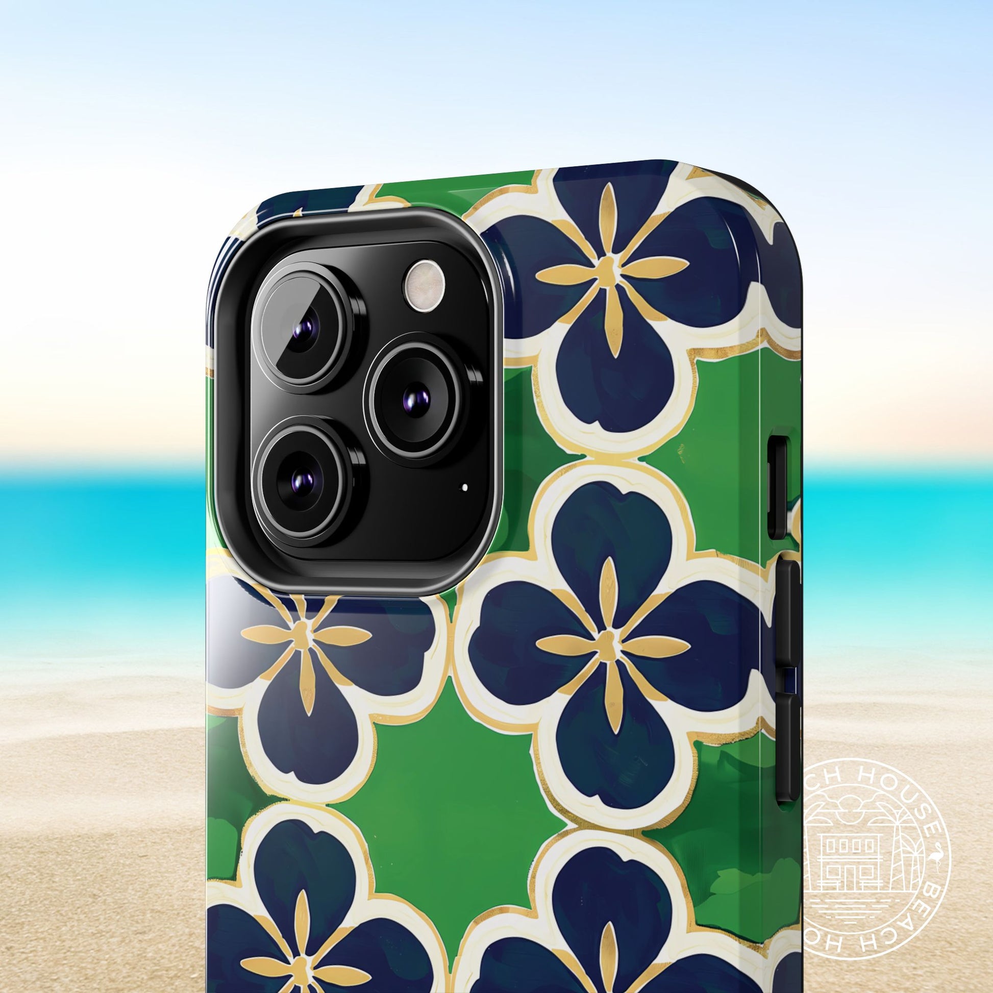 South Bend Tough Case for iPhone with blue floral design on a beach background