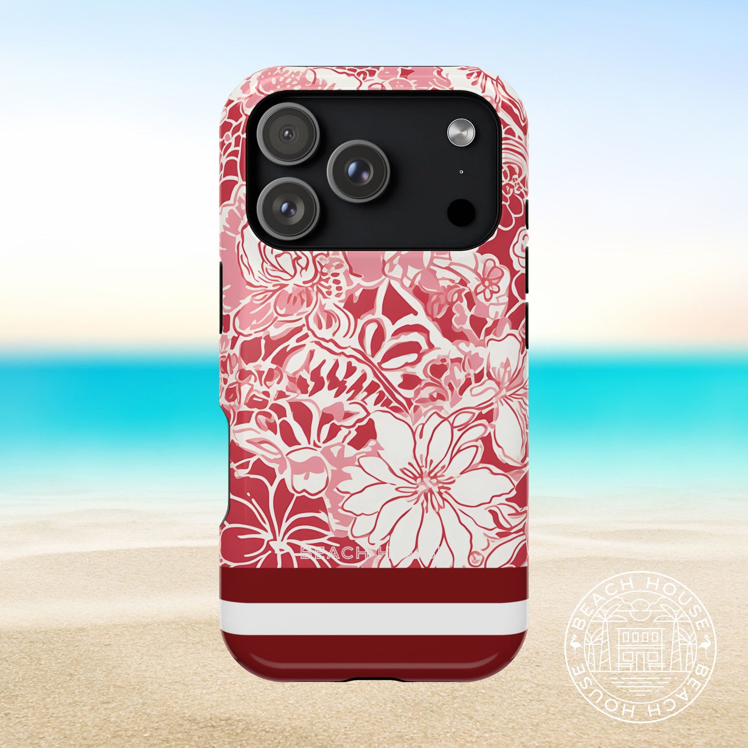 Norman MagSafe Tough Case for iPhone 17 Pro with floral design on a beach background