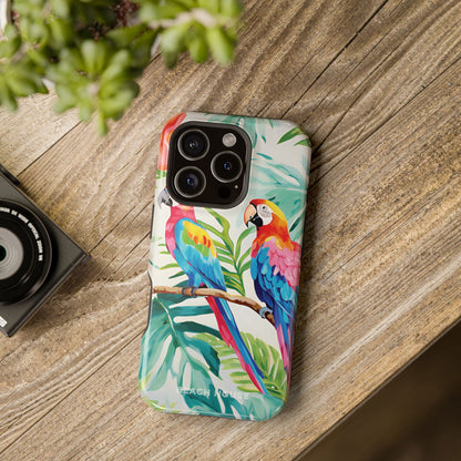 Copacabana MagSafe Tough Case for iPhone with parrot design on a wooden surface