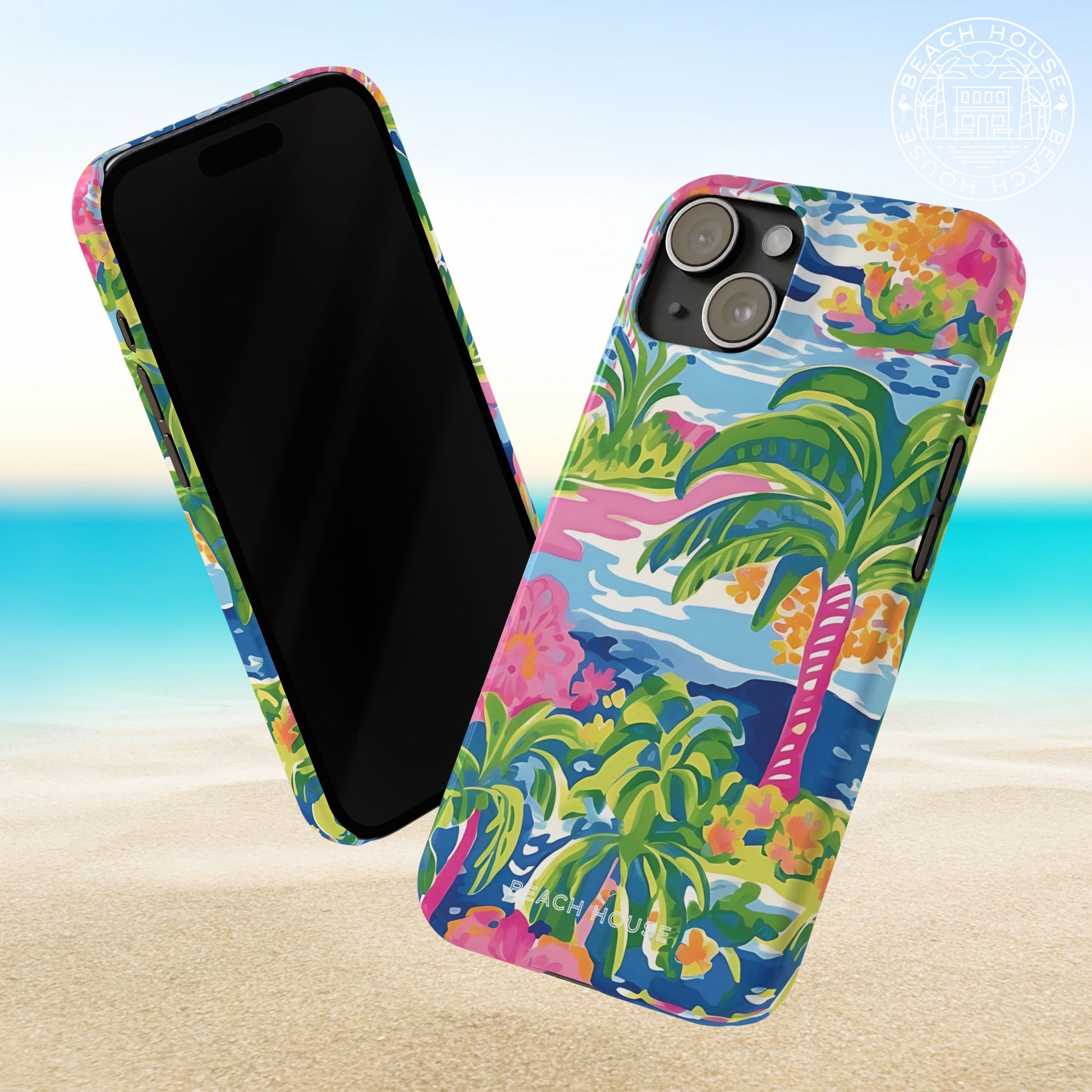 Front and back view of Kiawah Slim Case for iPhone with tropical design on a beach background