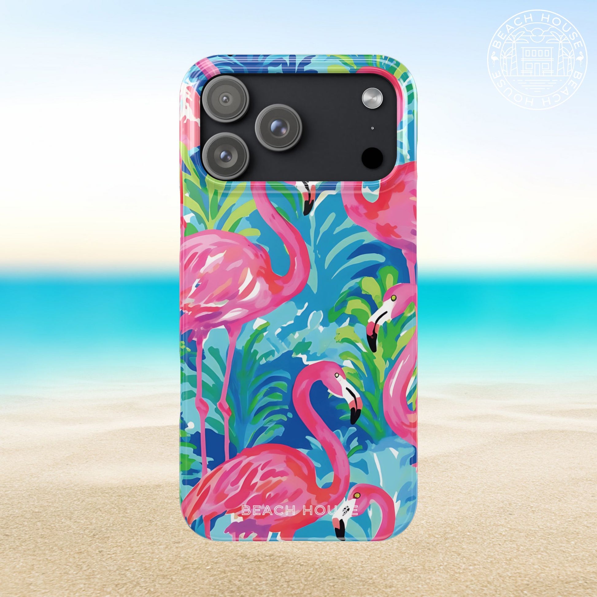 Key Largo Slim Case for iPhone 17 Pro Max with flamingo design on a beach background