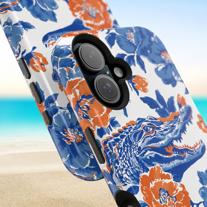 Gainesville MagSafe Tough Case for iPhone with blue and orange floral design and alligator on a beach background