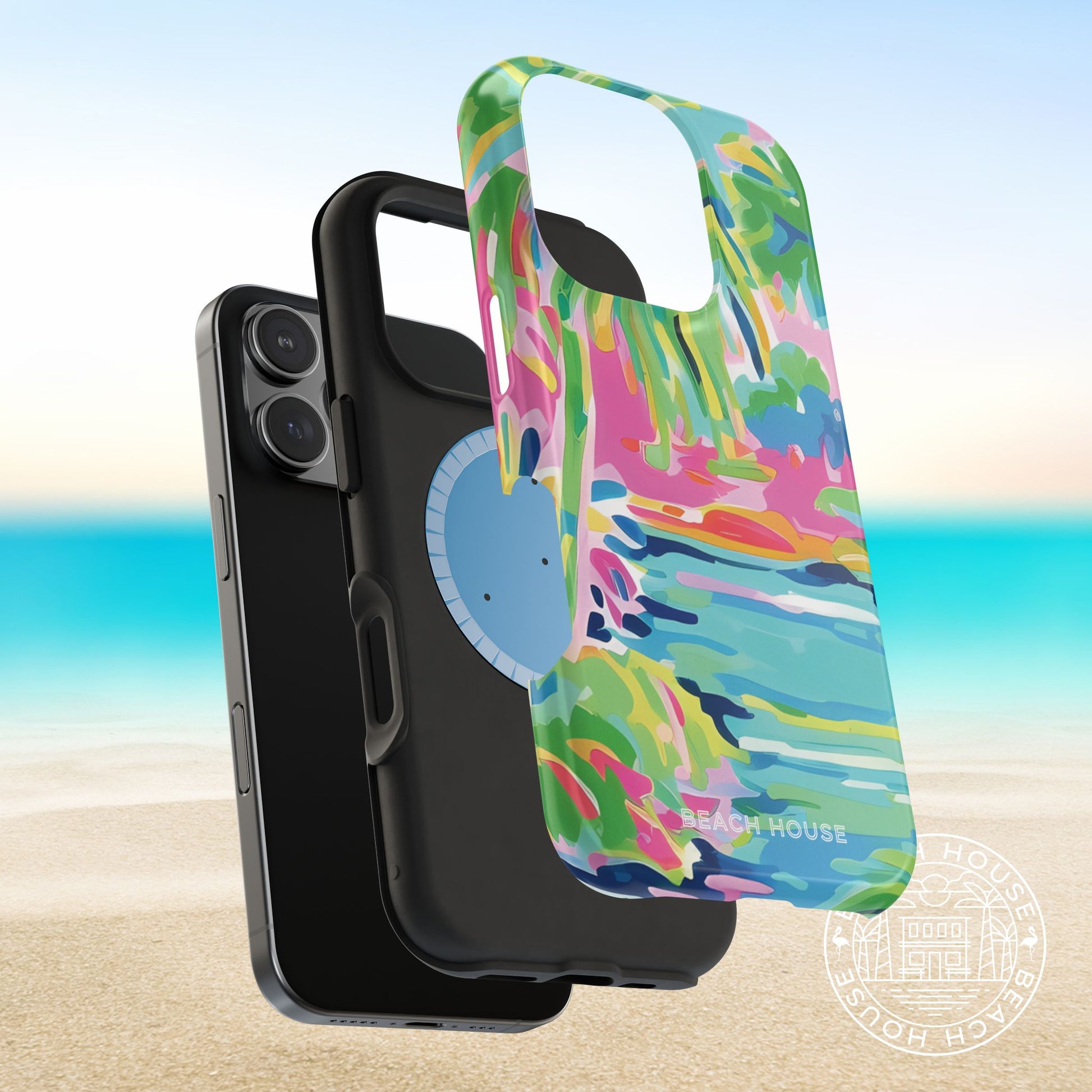 Layers of the Delray MagSafe Tough Case for iPhone with a brand logo on a beach background