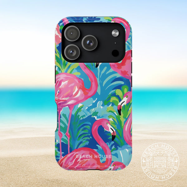 Key Largo MagSafe Tough Case for iPhone 17 Pro with flamingo design on a beach house branded background