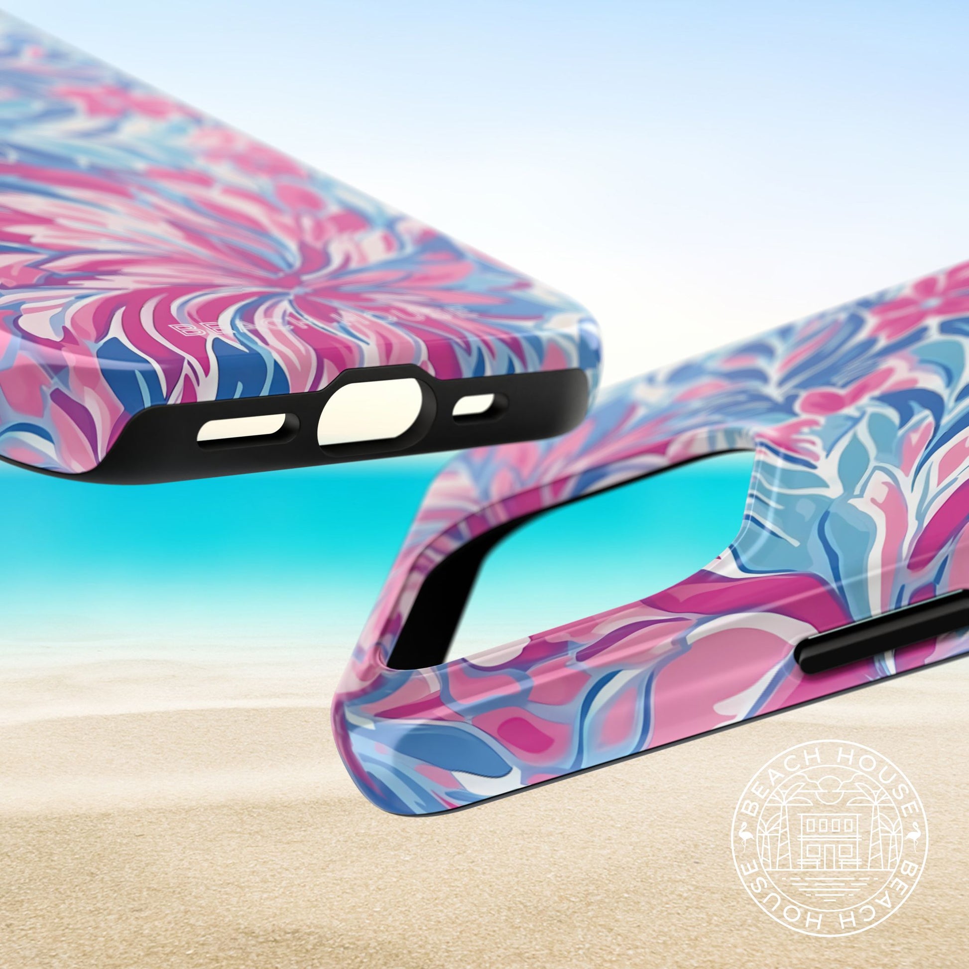 Top and bottom views of Destin Tough Case for iPhone with a marbled design on a reflective surface.
