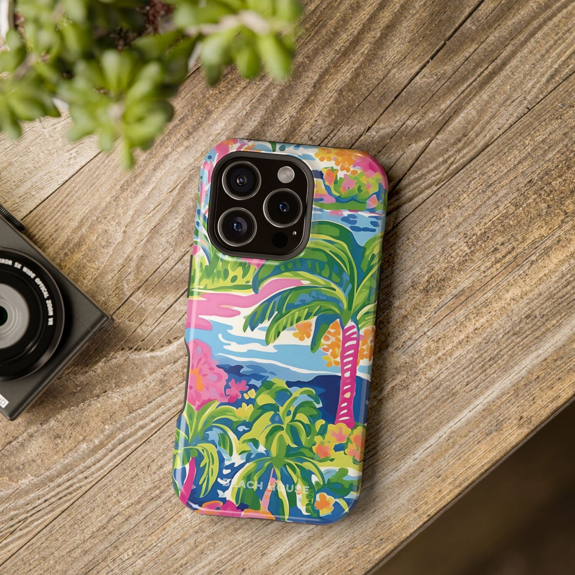 Colorful Kiawah MagSafe Tough Case for iPhone with tropical design on a wooden surface