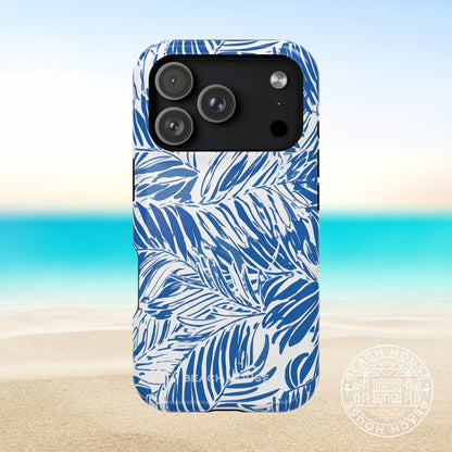 Hampton MagSafe Tough Case for iPhone 17 Pro with blue leaf pattern on a beach background