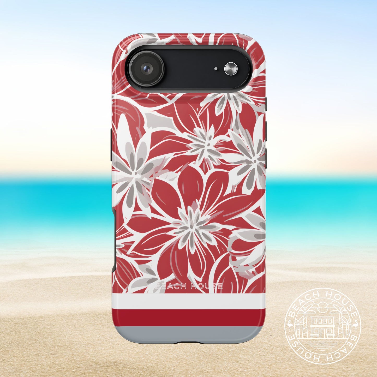 Columbus Tough case for iPhone 17 Air with red and white floral pattern on a beach background