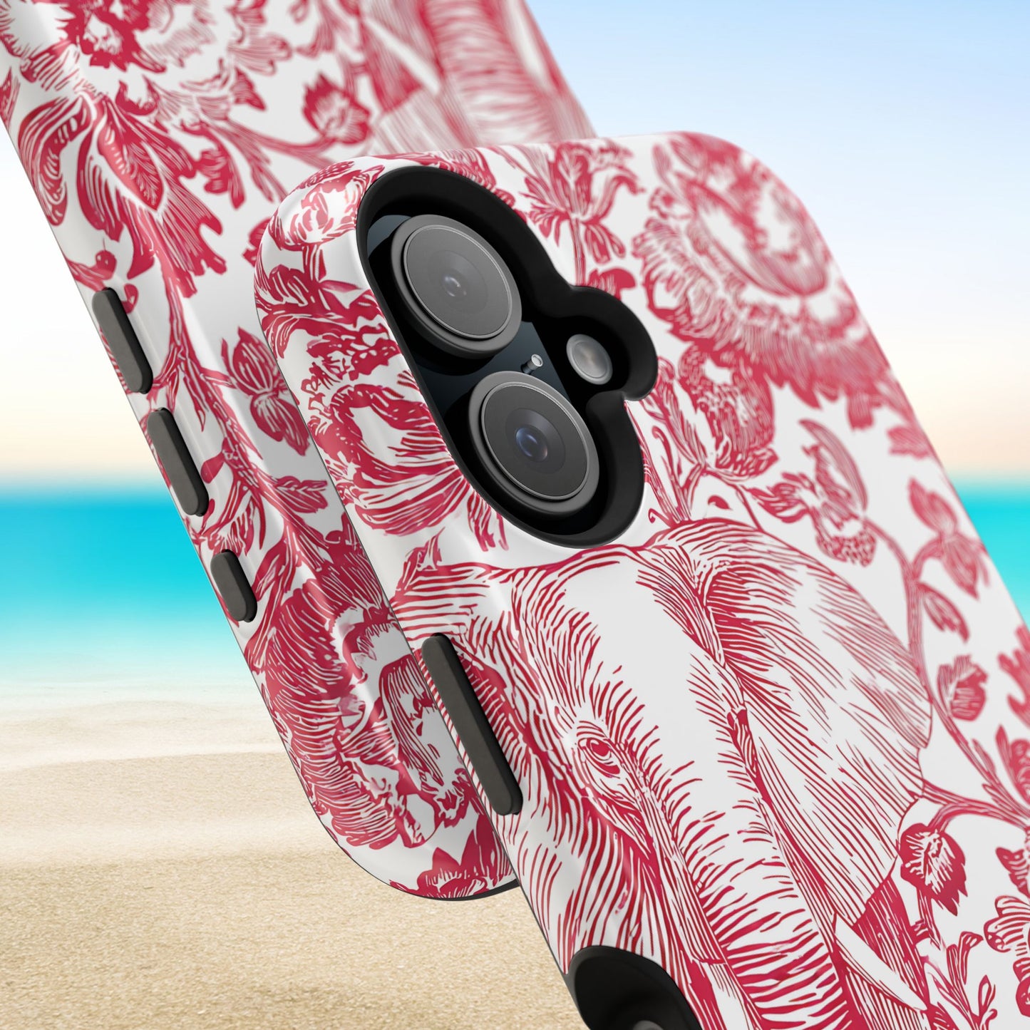 Tuscaloosa MagSafe Tough Case for iPhone with red floral and elephant design on a beach background