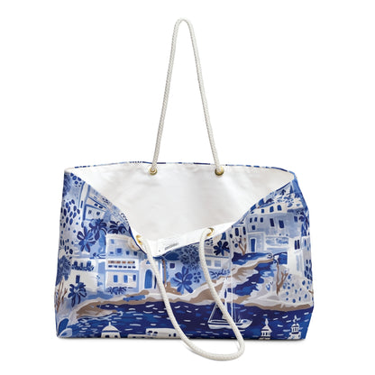 Lightweight beach tote bag with blue and white Santorini pattern on a white background