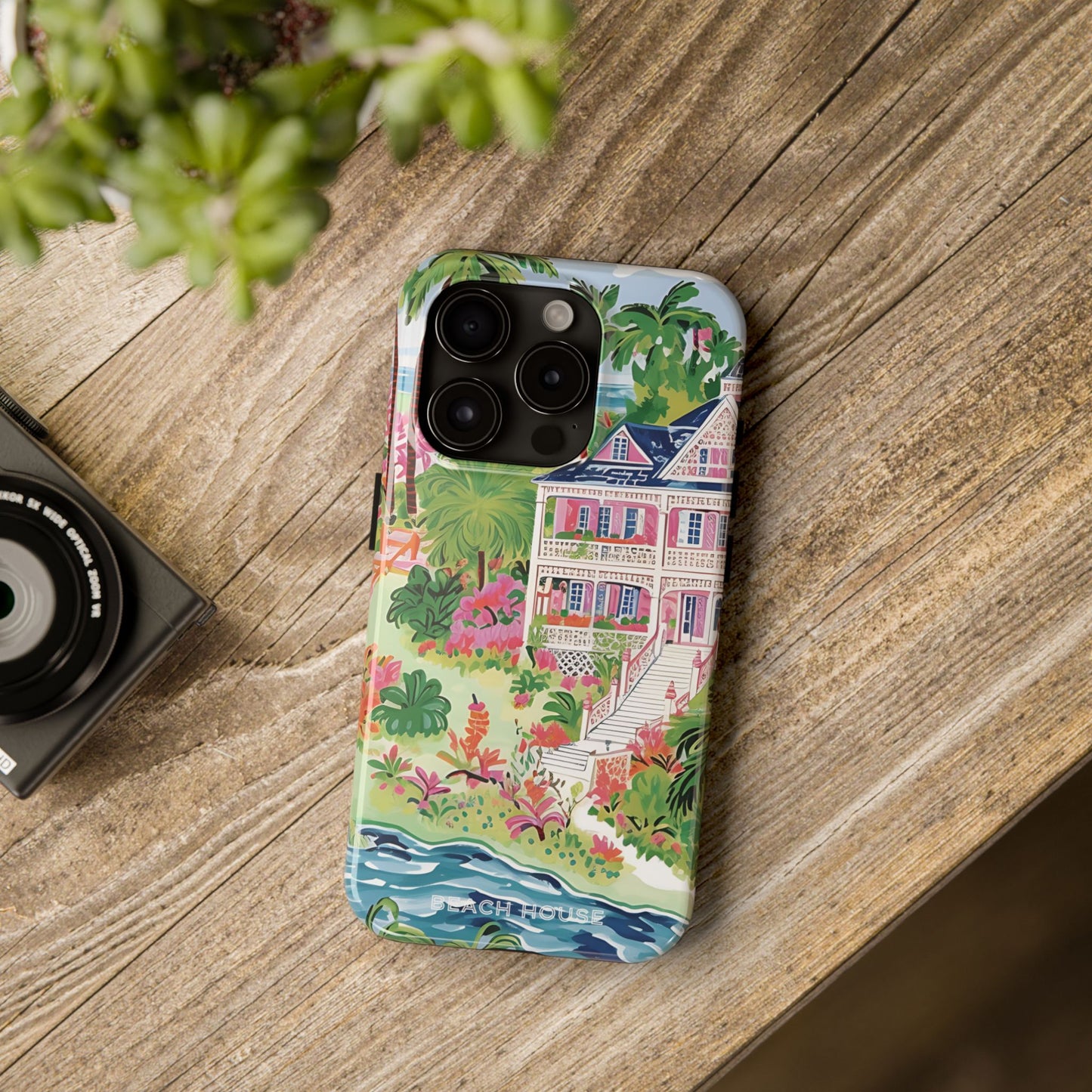 Charleston Tough Case for iPhone with tropical house design on a wooden surface