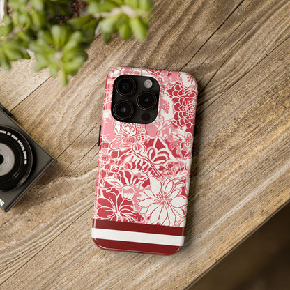 Norman Tough Case for iPhone with floral design on a wooden surface next to a camera