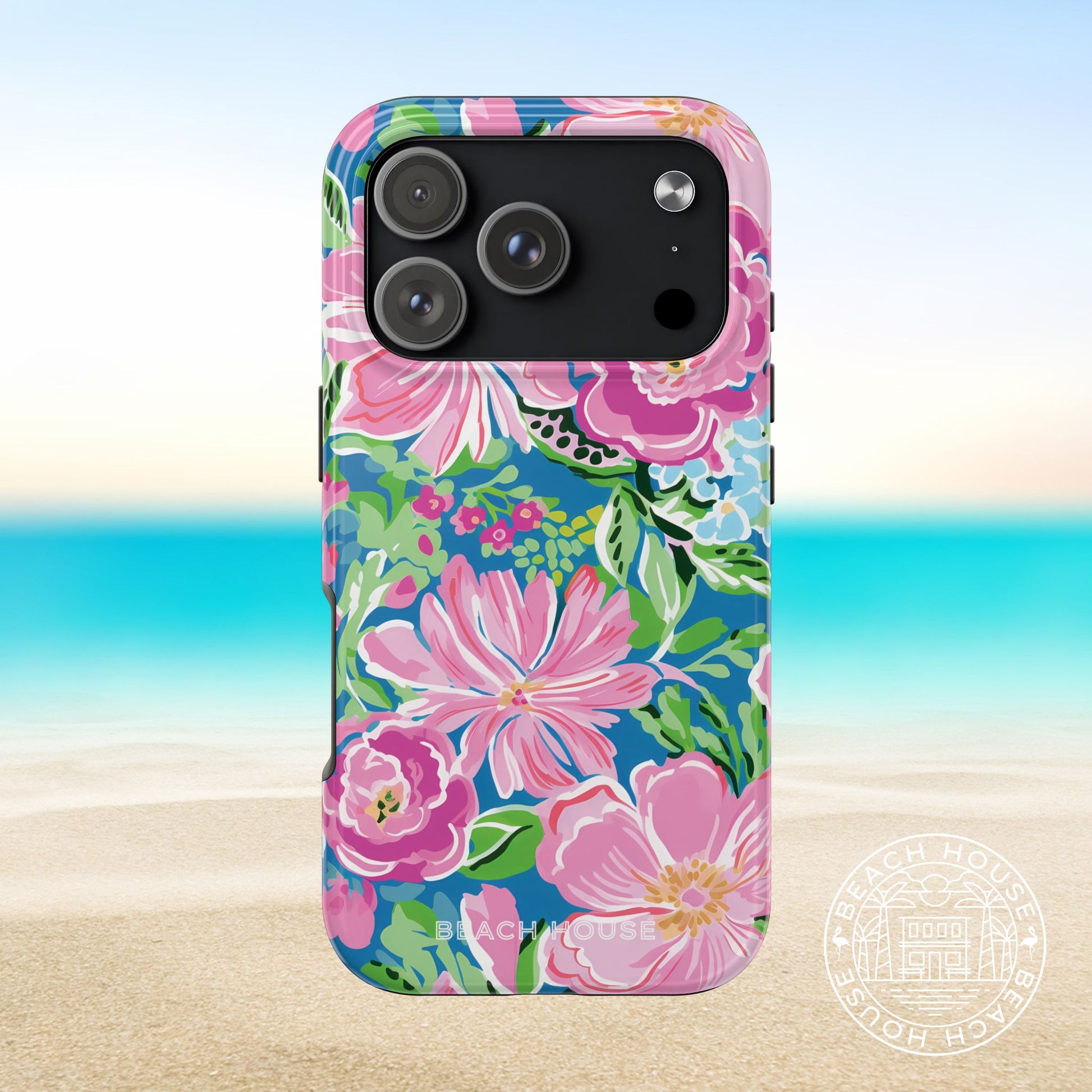 Madeira Tough Case for iPhone with pink floral design on a beach background