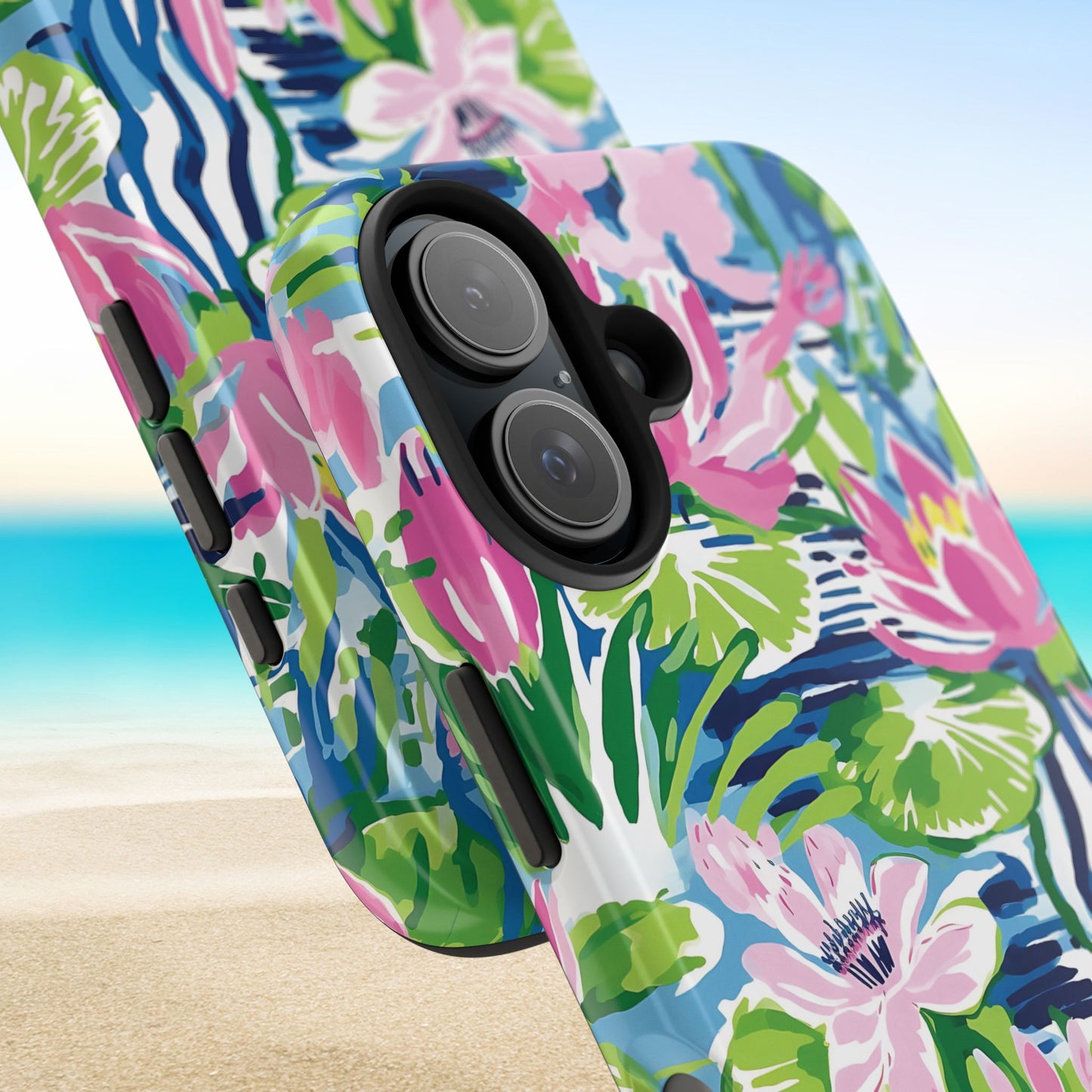 Close up views of the Everglades Tough Case for iPhone with colorful floral design on a beach background
