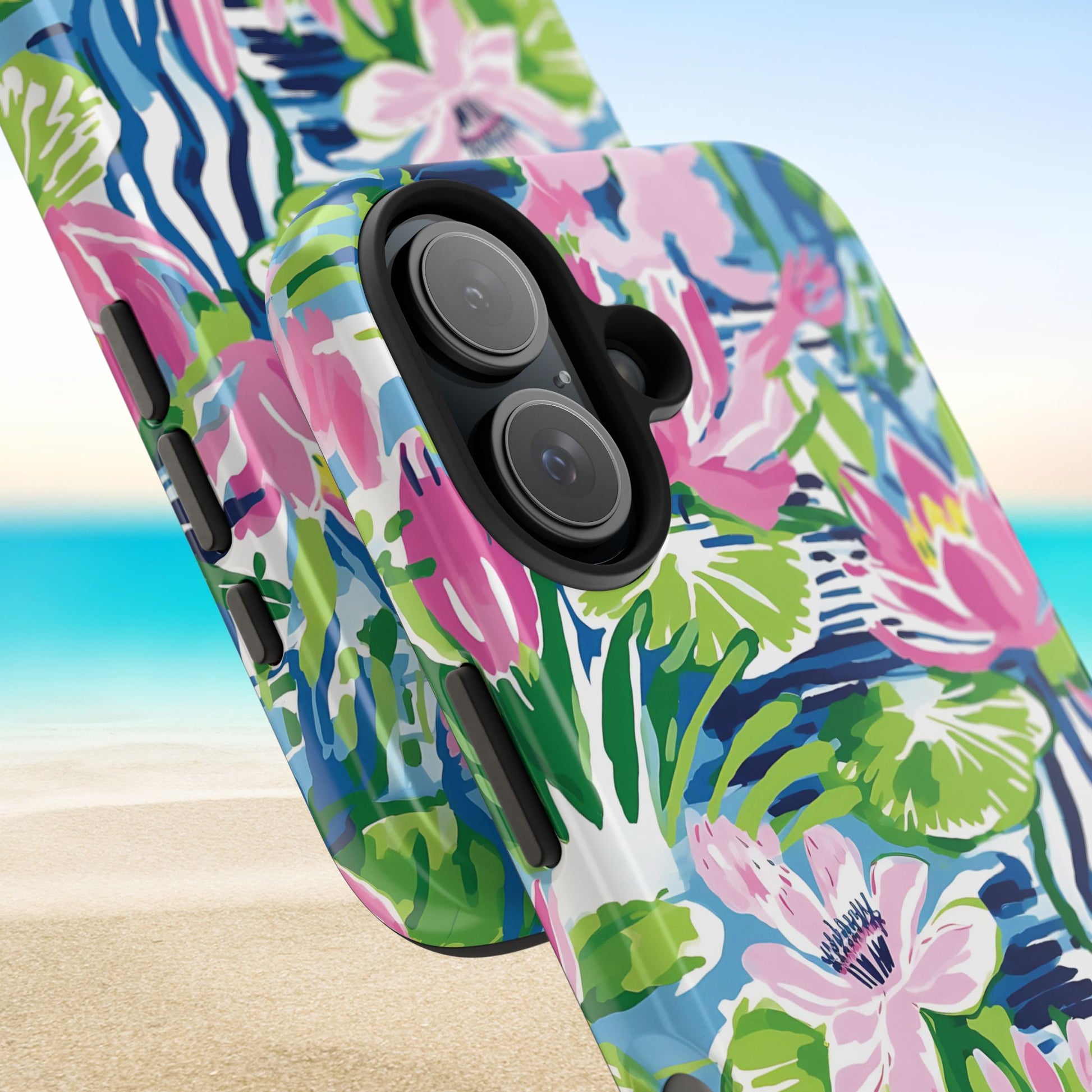 Close up views of the Everglades Tough Case for iPhone with colorful floral design on a beach background