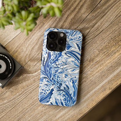 Nags Head case for iPhone with blue floral pattern on a wooden surface