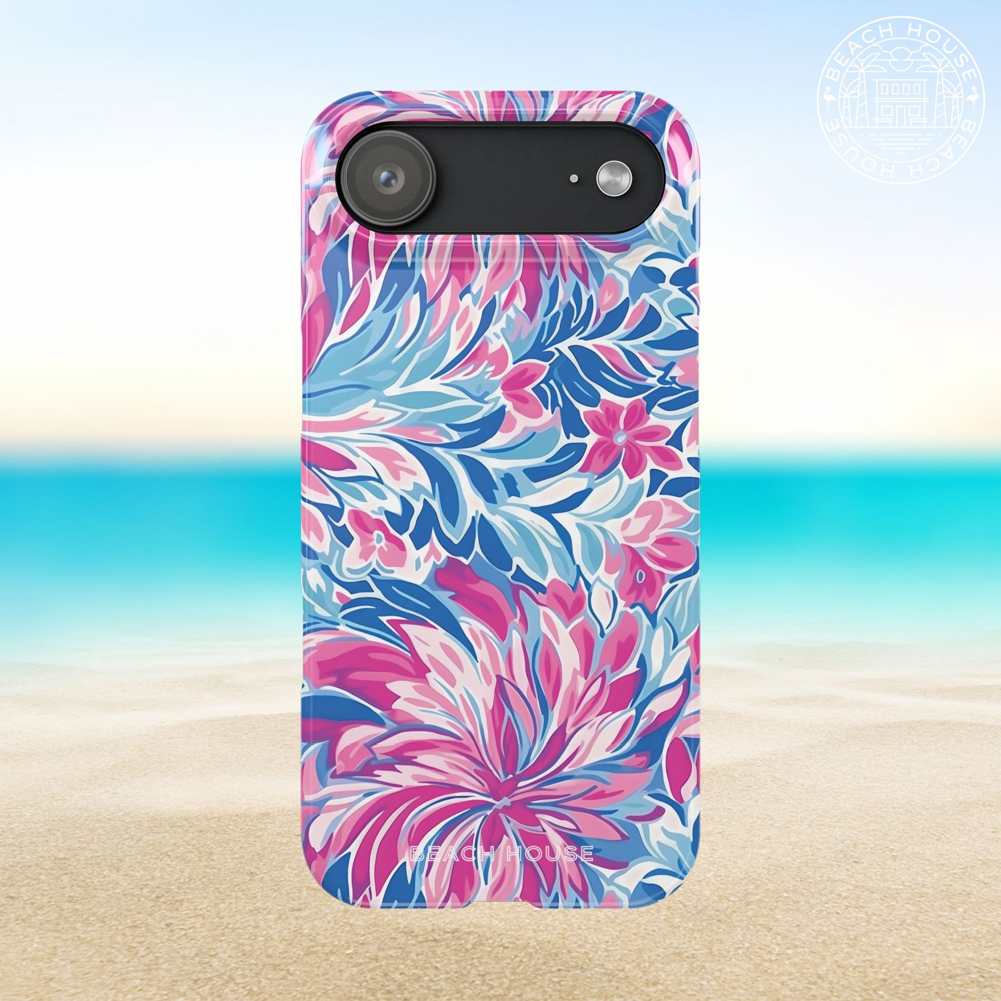 Destin Slim Case for iPhone 17 Air with pink and blue floral pattern on a beach background