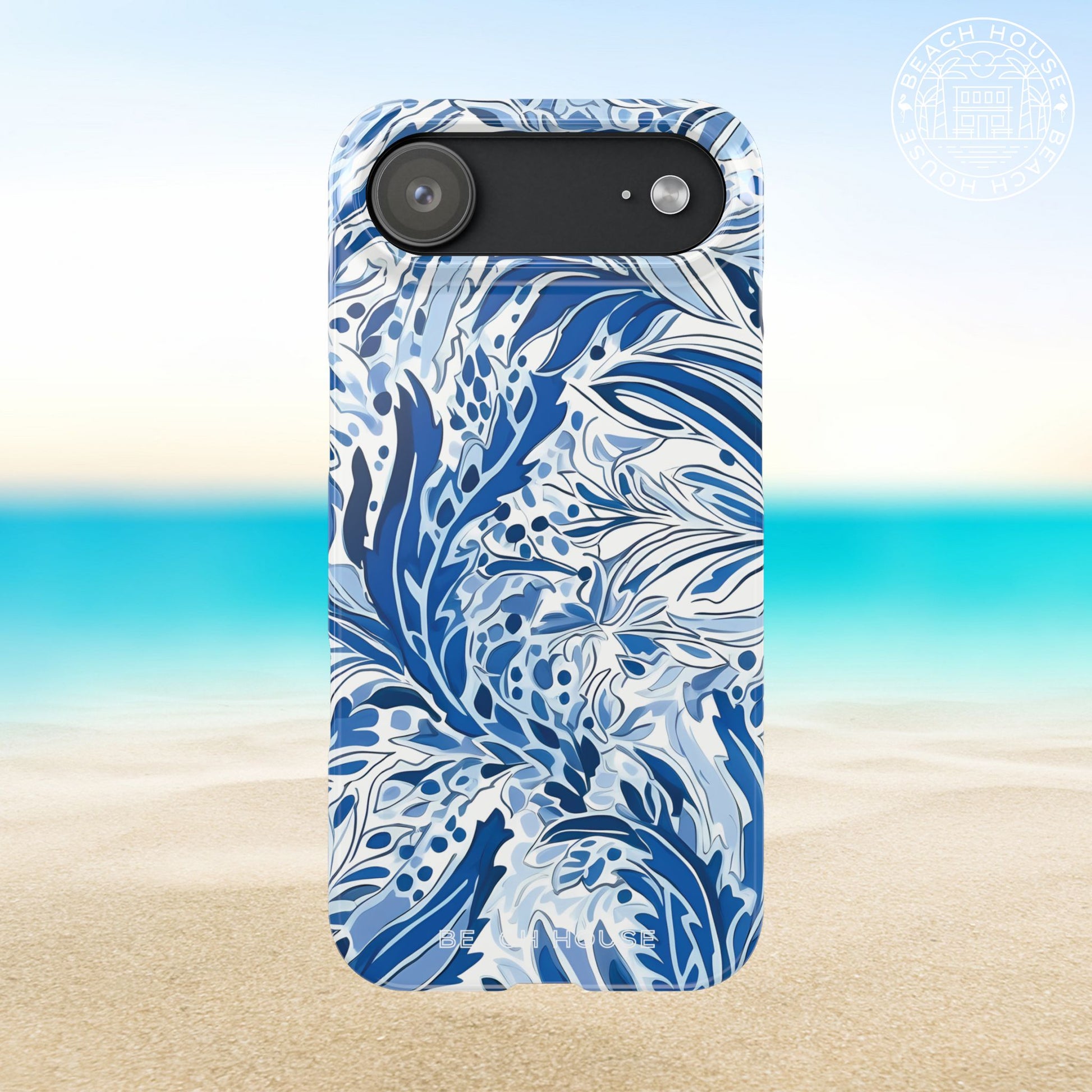 Nags Head Slim Case for iPhone 17 Air with blue and white floral pattern on a beach background