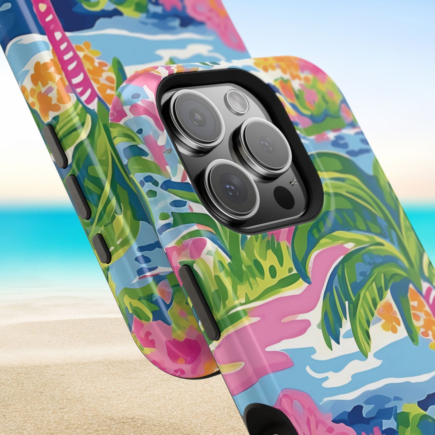 Close up views of the Kiawah MagSafe Tough Case for iPhone with tropical design on a beach background