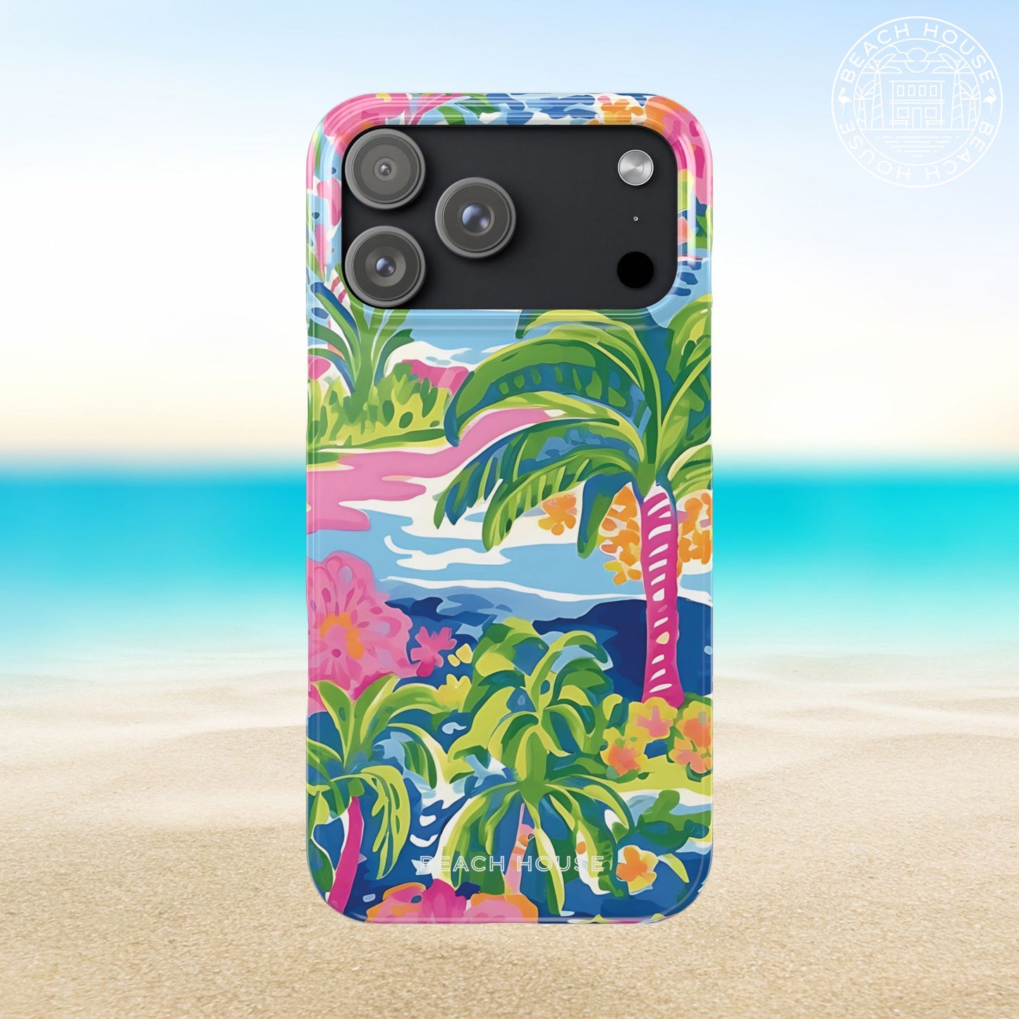 Kiawah Slim Case for iPhone 17 Pro Max with tropical design featuring palm trees and flowers on a beach background