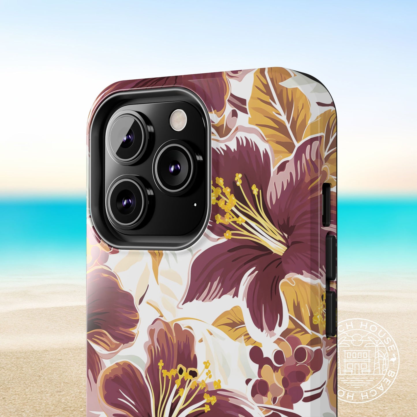 Floral patterned Tallahassee Tough Case for iPhone with a blurred beach background