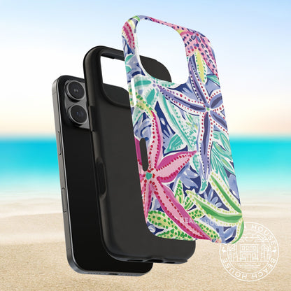 Layers of the Siesta Key Tough Case for iPhone with colorful floral design on a beach background